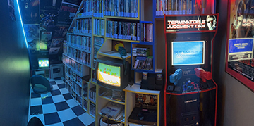 the airbnb in Florida with the retro 80s and 90s arcade and video store room